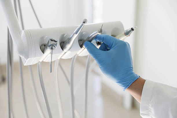 Professional Tooth Extraction technician working in Sudley, VA